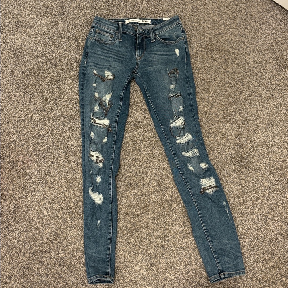 Lovers + Friends Blue Distressed Skinny Jeans. Gently used wore 2 times.